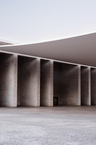 Grey concrete building during the day
